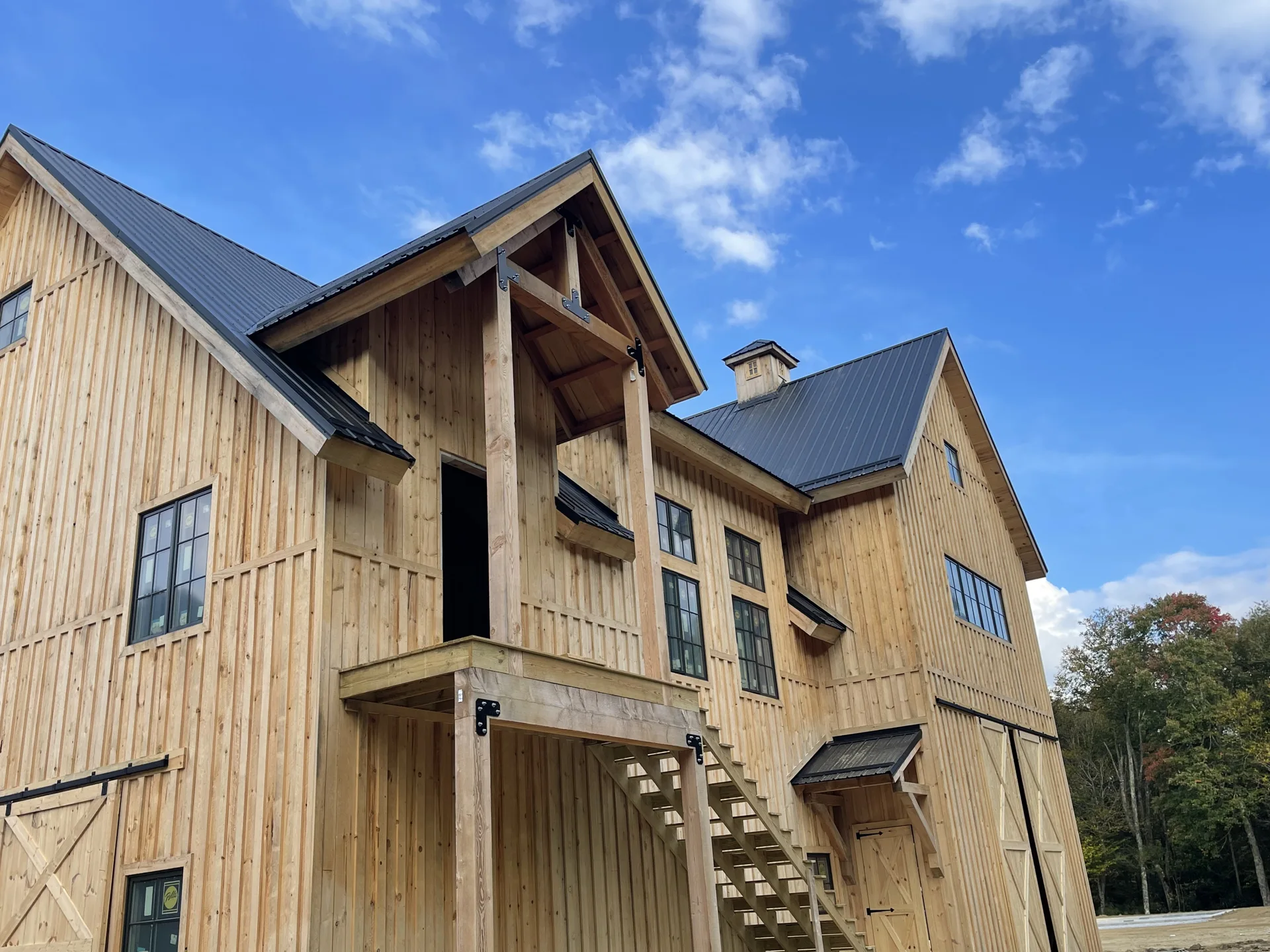 Timber and sheathing on a multi-story home under construction